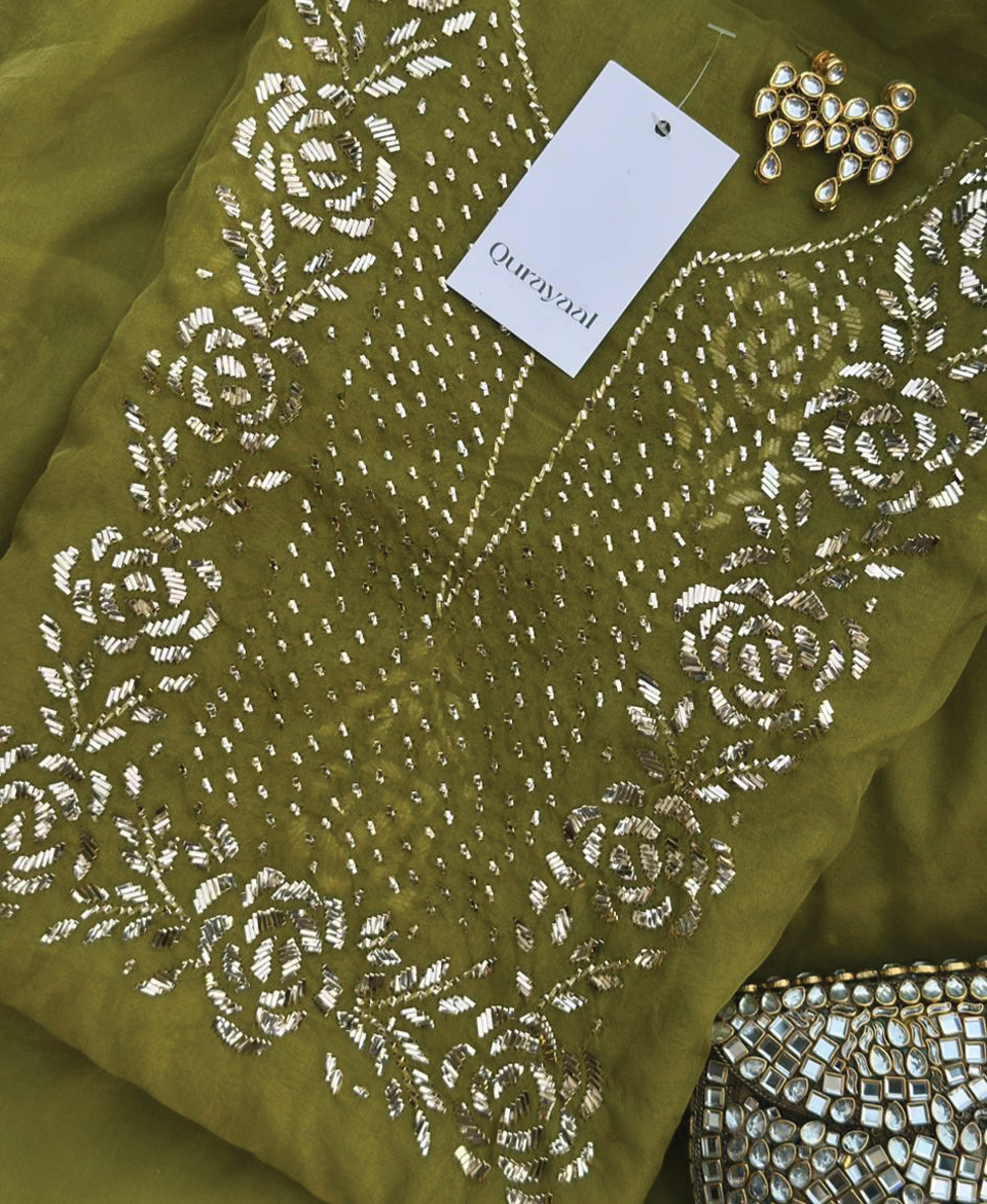 Olive green organza festive formal suit by Qurayaal