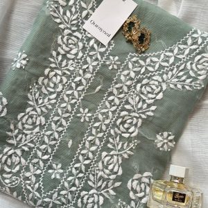 Turquoise hand embroidered outfit on cotton net